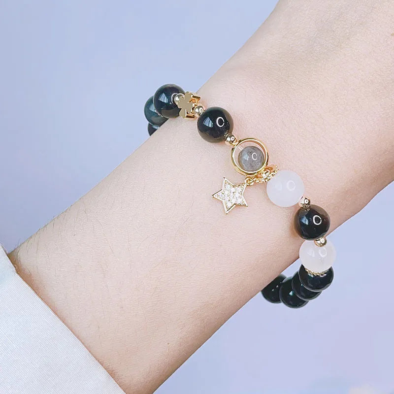 Silverstone electroplated women's bracelet with adjustable clasp and choice of floral, heart, or star charm designs