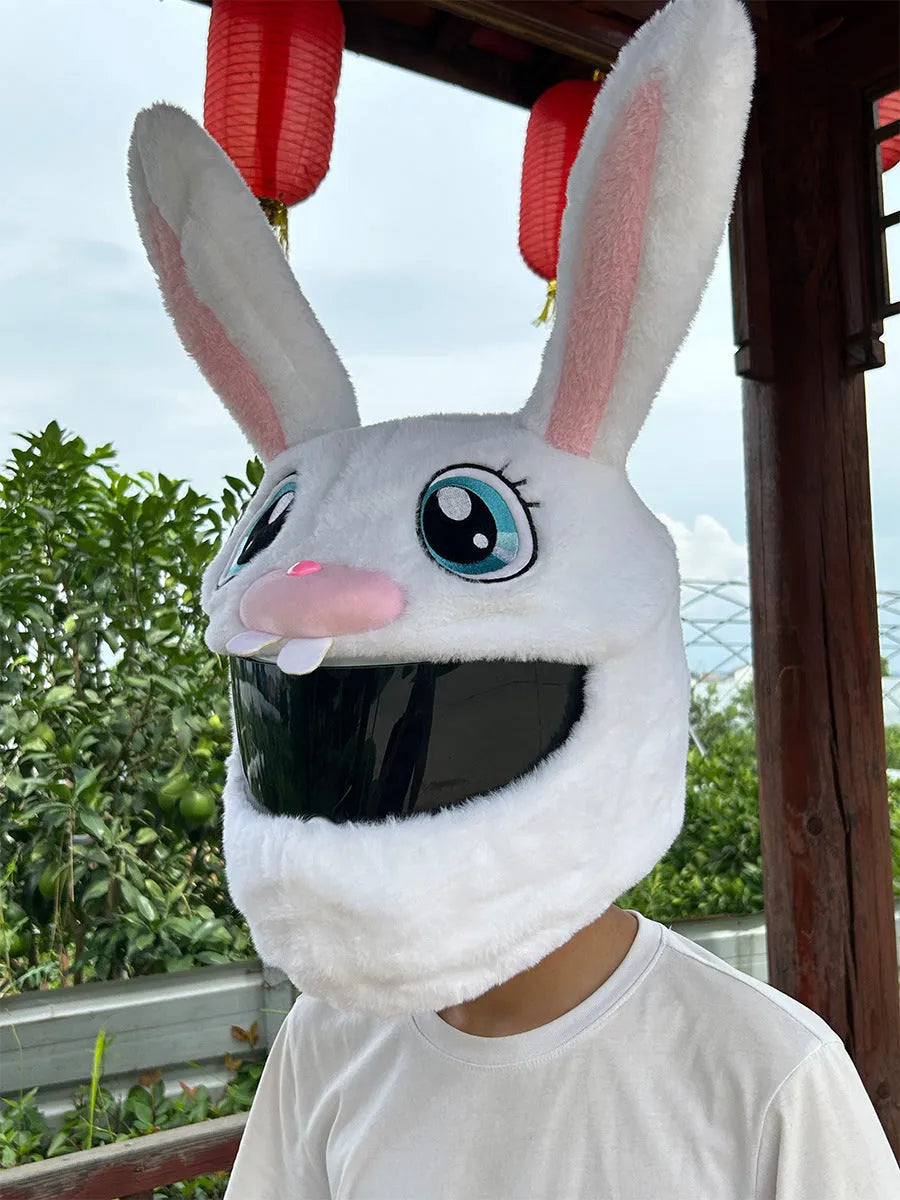 Long eared white rabbit plush cover on an electric motorcycle helmet.