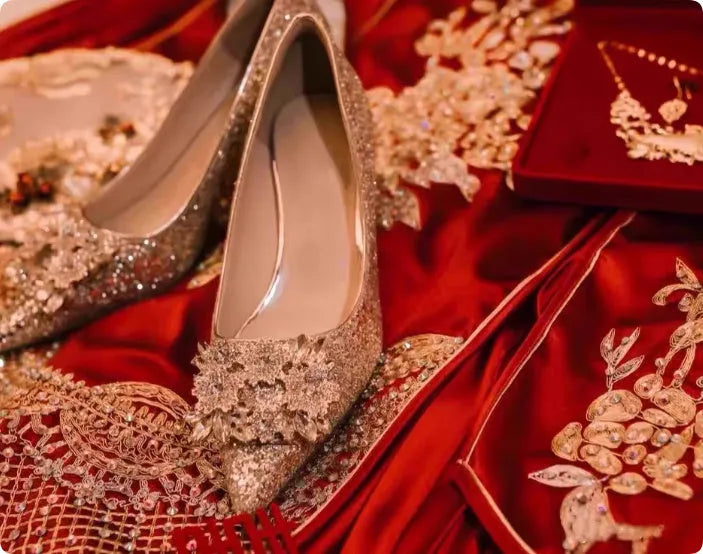 Champagne coloured women's wedding shoes with crystal rhinestones and a pointed toe, shown with a high heel.