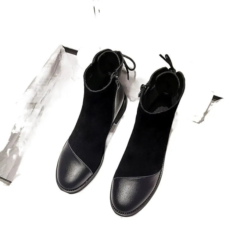 Black knee-high women's Martin boots with a side zipper, round toe, and bow detail.