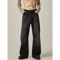 Black retro straight leg jeans with loose fit and zipper fly on hanger