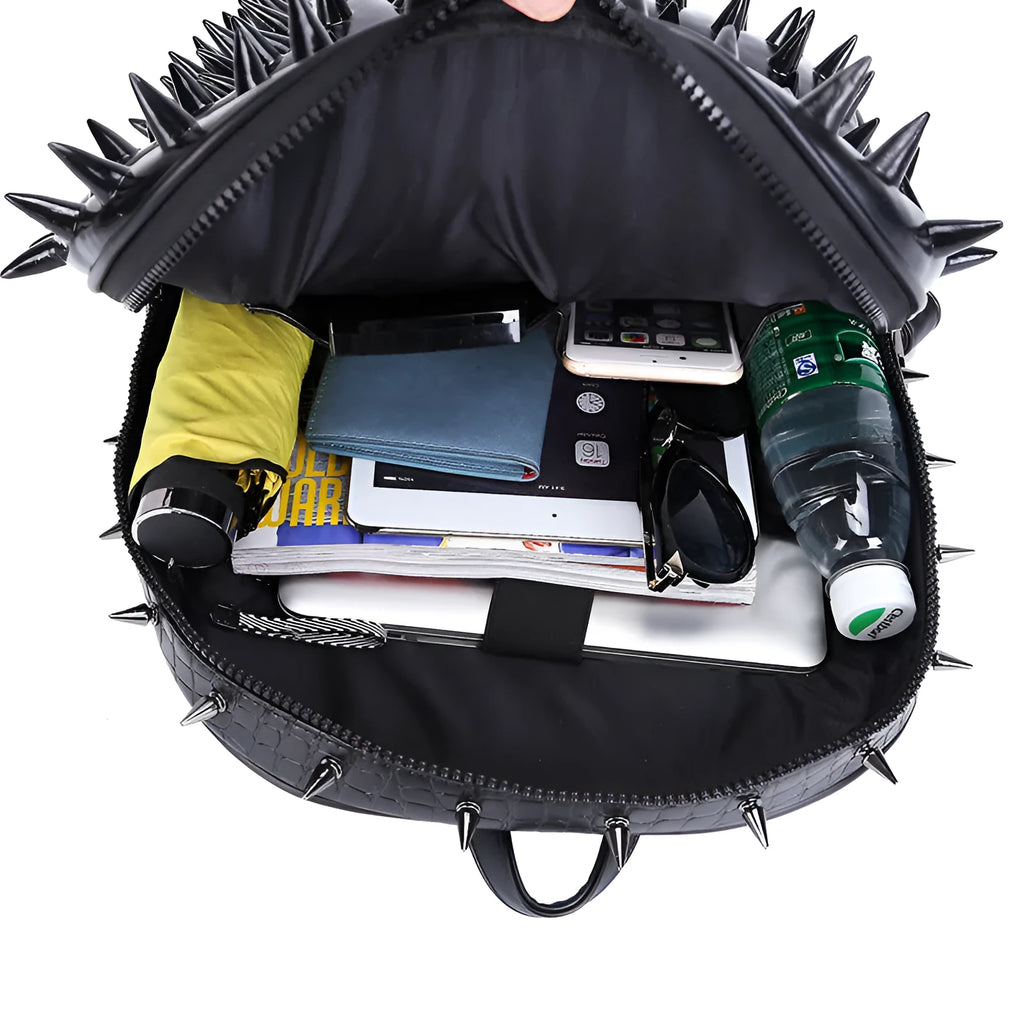 Women's wolf proof PU leather backpack in black with zipper closure, hollow-out design, and two shoulder straps.