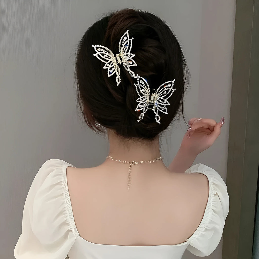 Butterfly-shaped alloy hair clip with rhinestone or pearl decorations, 6.7 cm wide