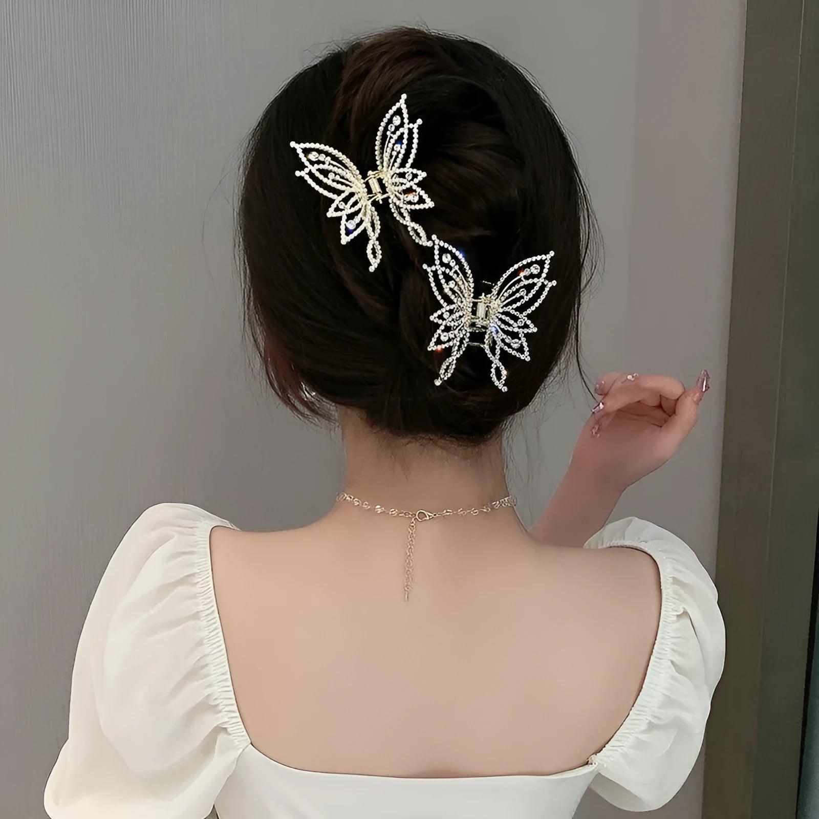 Butterfly-shaped alloy hair clip with rhinestone or pearl decorations, 6.7 cm wide