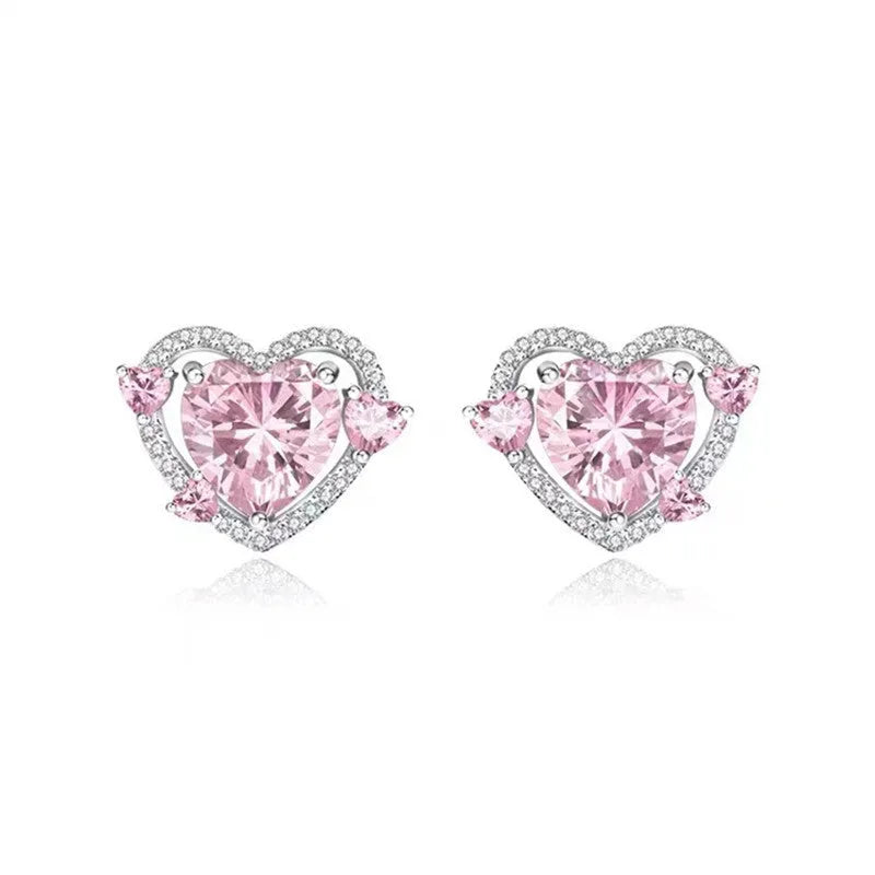 White k gold electroplated heart shaped stud earrings on copper material