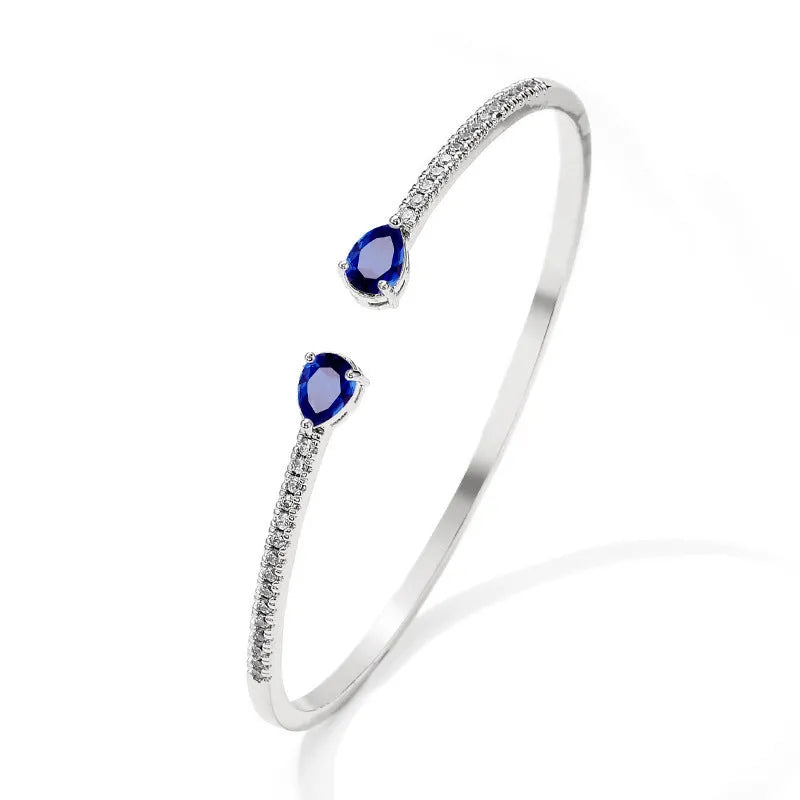 Copper bracelet with inlaid white zircon stones in simple jewellery design