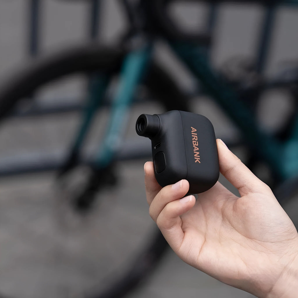 Black AS100 USB rechargeable mini electric pump for bicycle tyres with charging cable and waterproof bag