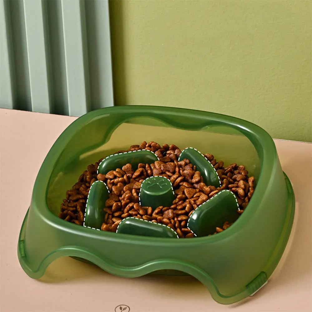 Blue plastic dog slow feeder bowl with interior ridges to control eating speed