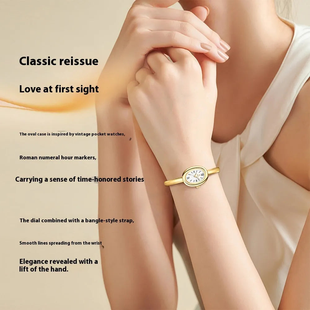 Women's oval-faced retro quartz watch in gold colour with slim 8mm profile