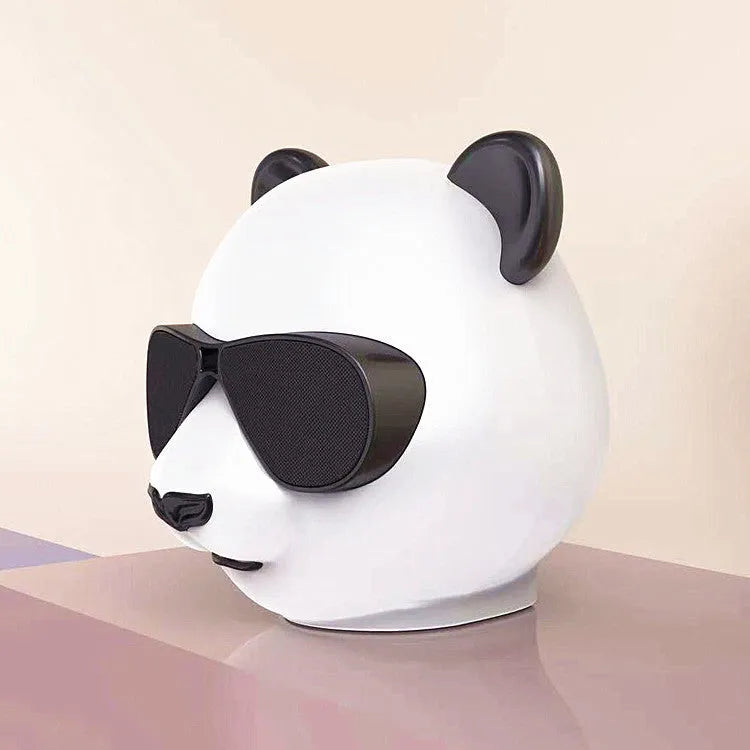 Portable mini Bluetooth speaker in classic style with USB port.