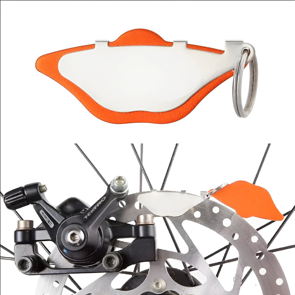 Mountain bike disc brake pads with metal brake linings in black and orange colour options