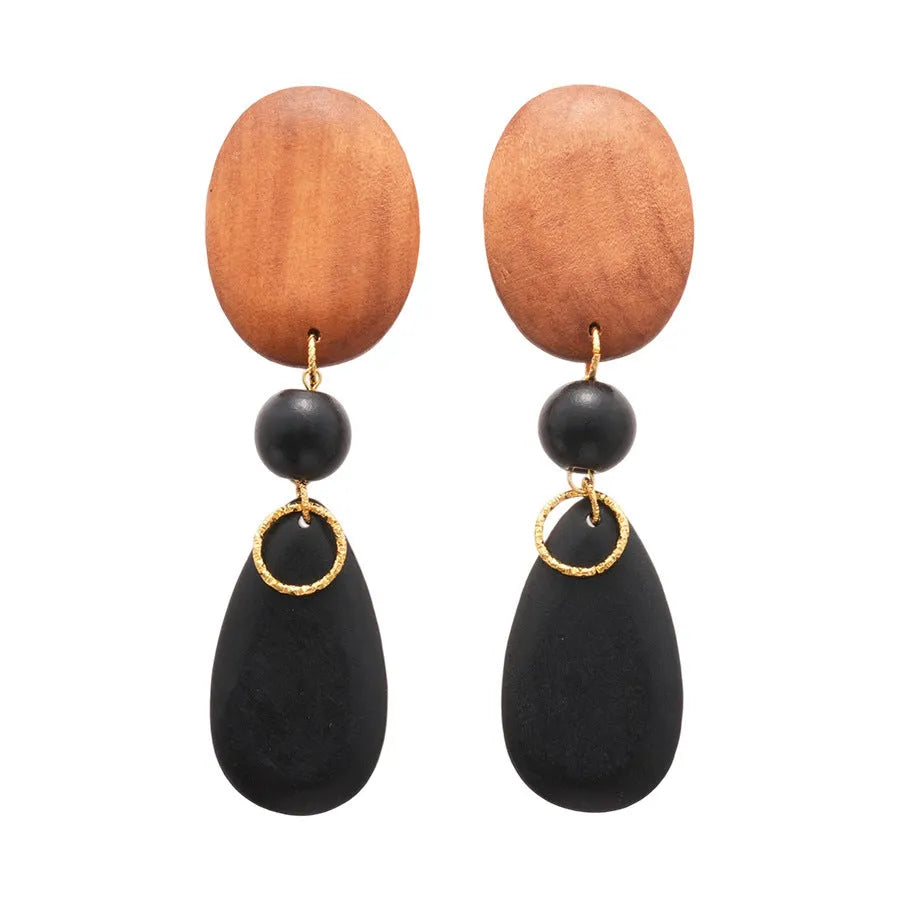 Brown-black wooden retro earrings with elliptical design and silver needle details