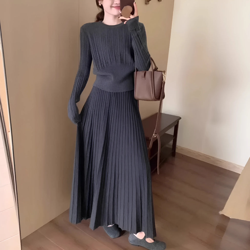 Dark grey knitted long dress suit with 3D texture, featuring a sweater and skirt in artistic retro style.