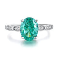 S925 sterling silver women's ring with geometric elliptical design featuring emerald stone and Palaibahao diamond inlay