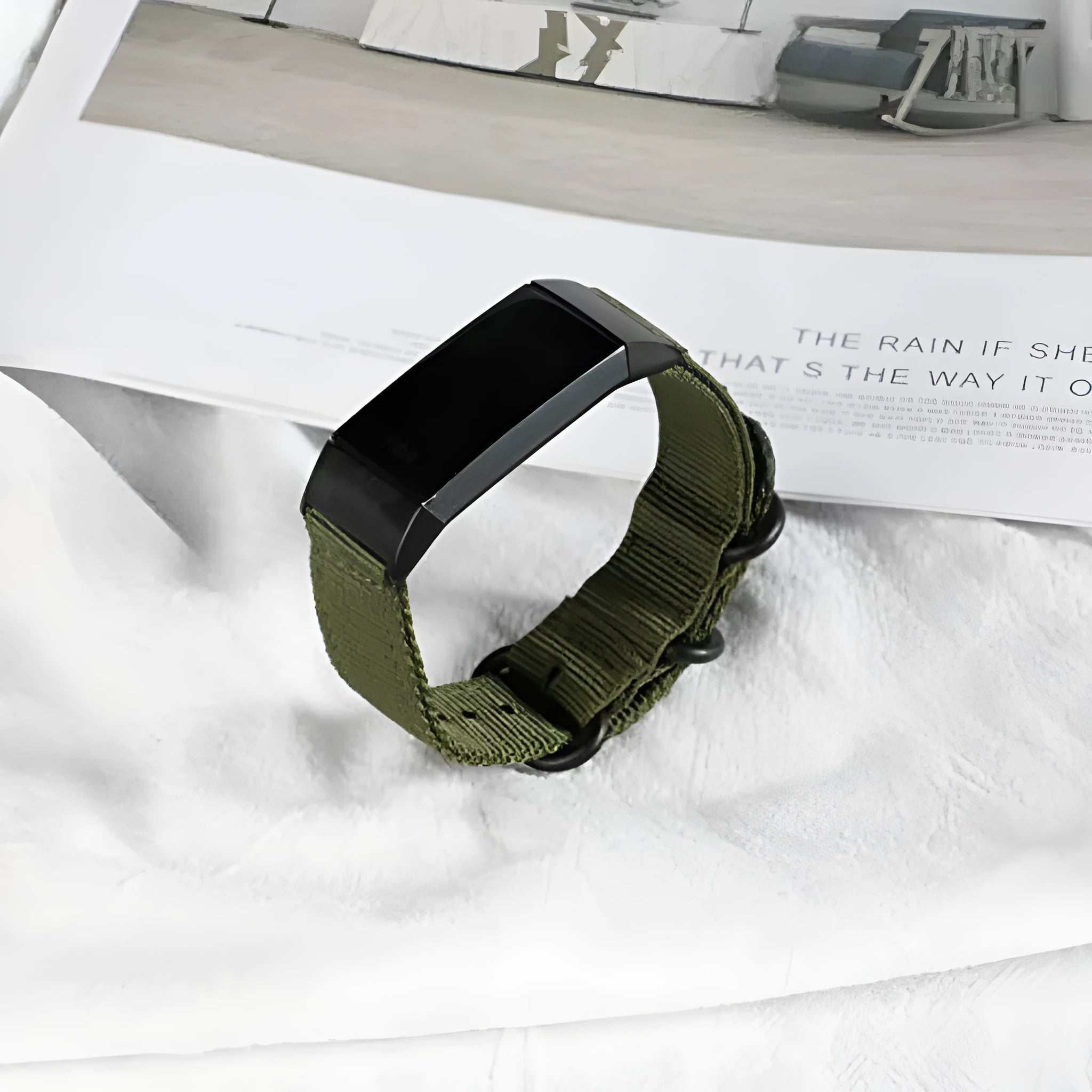 Nylon three-ring buckle replacement strap for Fitbit Charge fitness trackers in multiple colours.