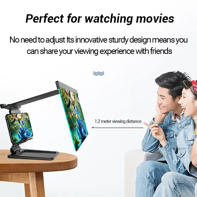 Black mobile phone screen amplifier with detachable phone holder on desktop surface
