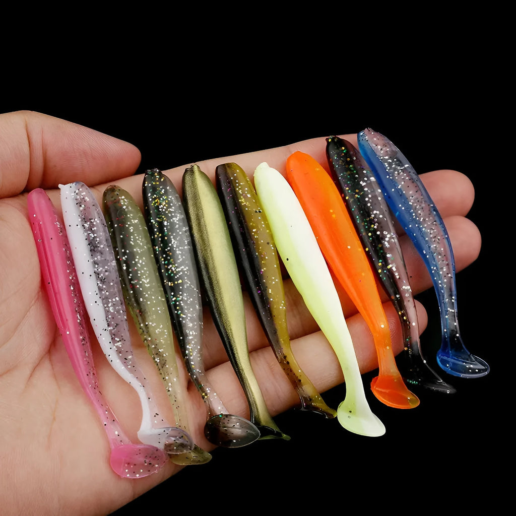 Close-up of a two-tone soft plastic worm fishing lure with a T-tail, measuring 7cm.