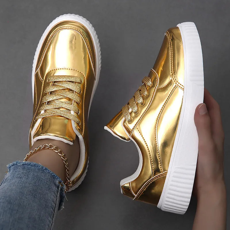 Sparkling gold sequinned platform sneakers with a round toe and thick MD sole.