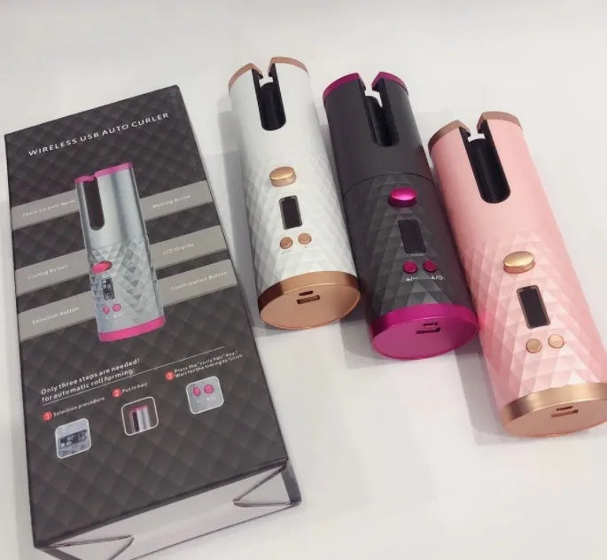 Portable white curling iron with a gold ceramic barrel, showing USB charging port and display with temperature settings.