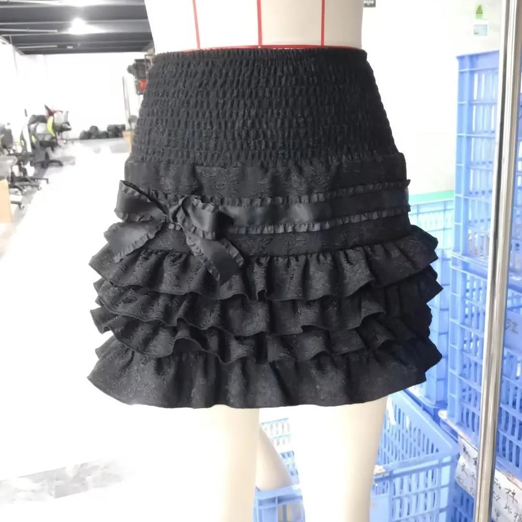 Girlish velvet puffy cake high waist skirt in polyester available in black pink and almond rice sizes S M L