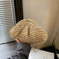 Shell-shaped straw beach bag with chain strap detail in khaki colour