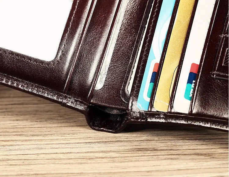 Men's leather bi-fold wallet with RFID protection in black or coffee brown