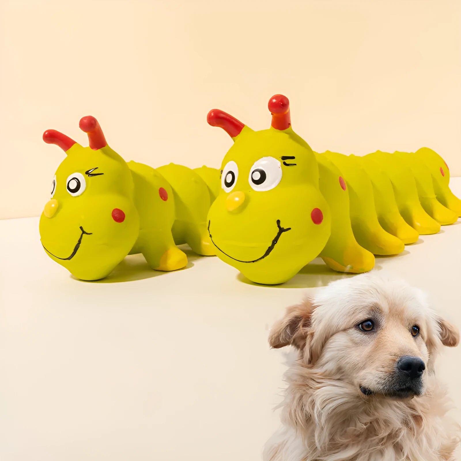 Yellow caterpillar-shaped rubber squeaky dog toy measuring 25.5cm long