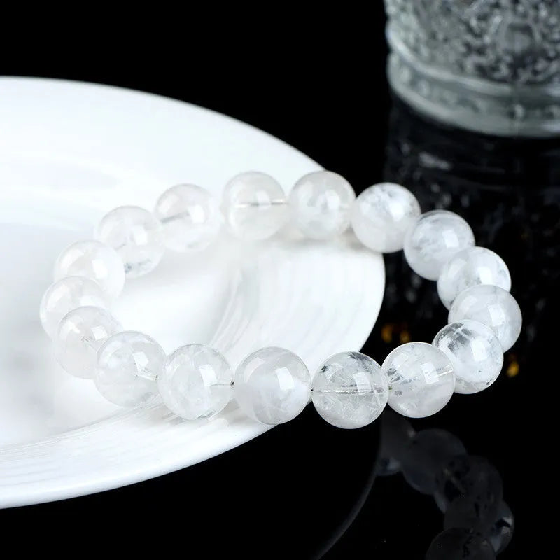 Women's crystal bracelet with natural blizzard snowflake round beads and geometric Ruyi Xiangyun design