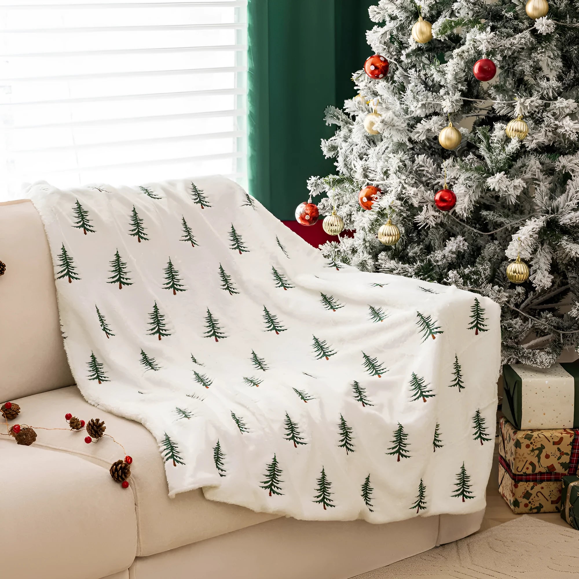 White polyester Christmas plush sofa blanket with embroidered Christmas tree on a sofa