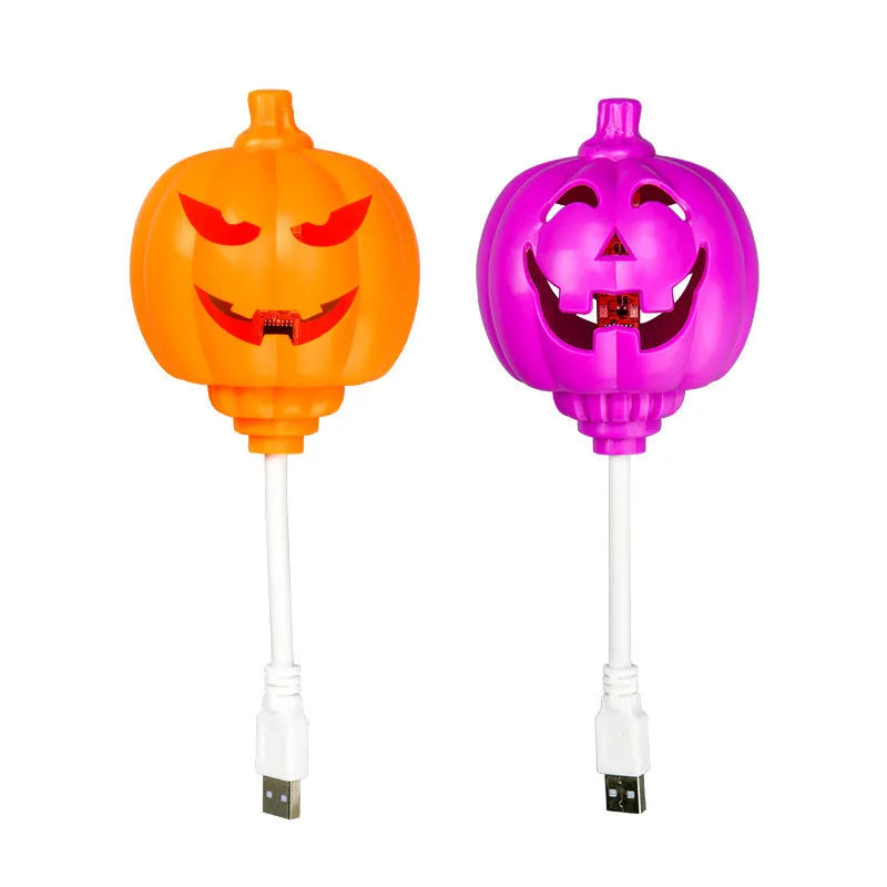 Plastic pumpkin-shaped decorative lamp with USB charging port, shown with purple or yellow light option.