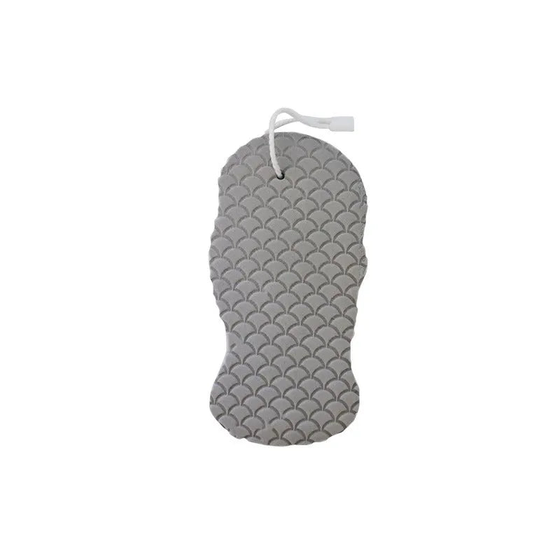 3D white bath sponge with fish scale pattern for gentle body exfoliation.
