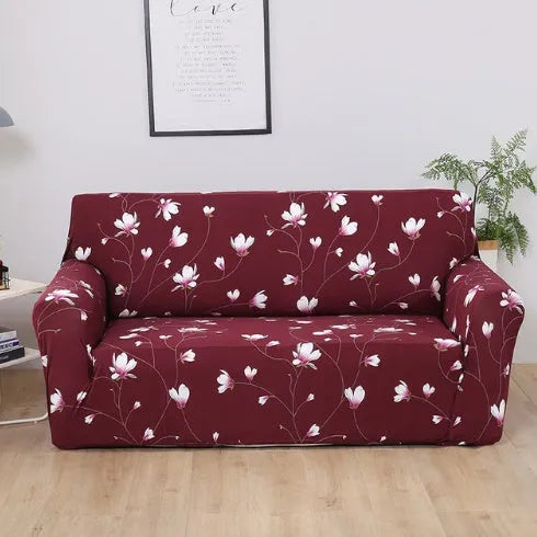 Stretch sofa cover in grey on a four-seater couch showing fitted corners and non-slip grip design
