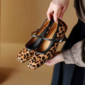 Women's black square toe stiletto heels with horse hair upper and ankle strap buckle