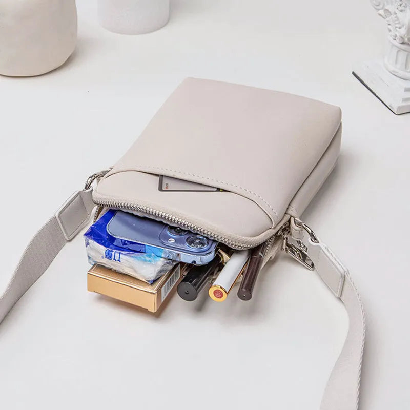 Solid colour PU crossbody shoulder bag for women in beige, showing compact size.