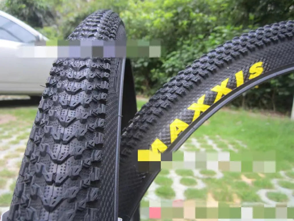 Mountain bike ultralight puncture-proof tyre shown in multiple sizes for 26, 27.5, and 29-inch wheels
