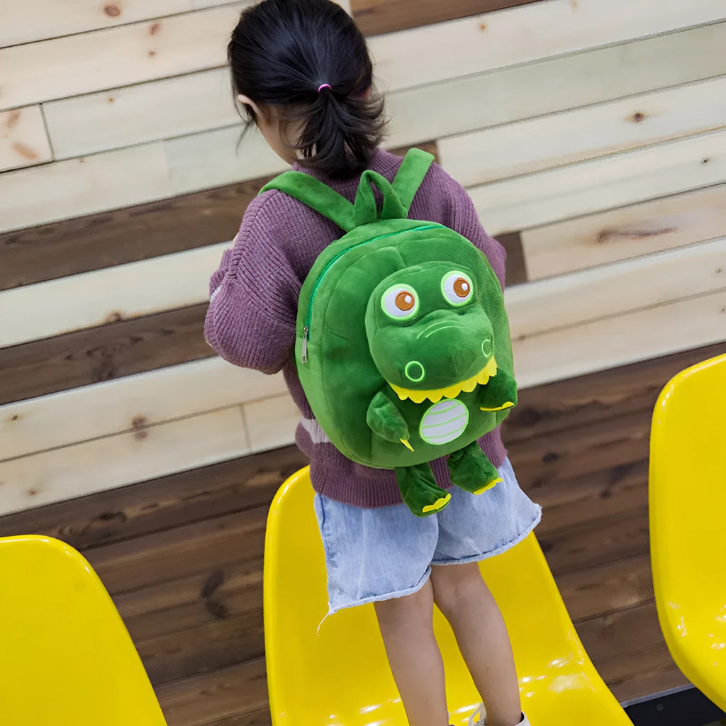 Children's dinosaur plush backpack with embroidery patterns in multiple colour options