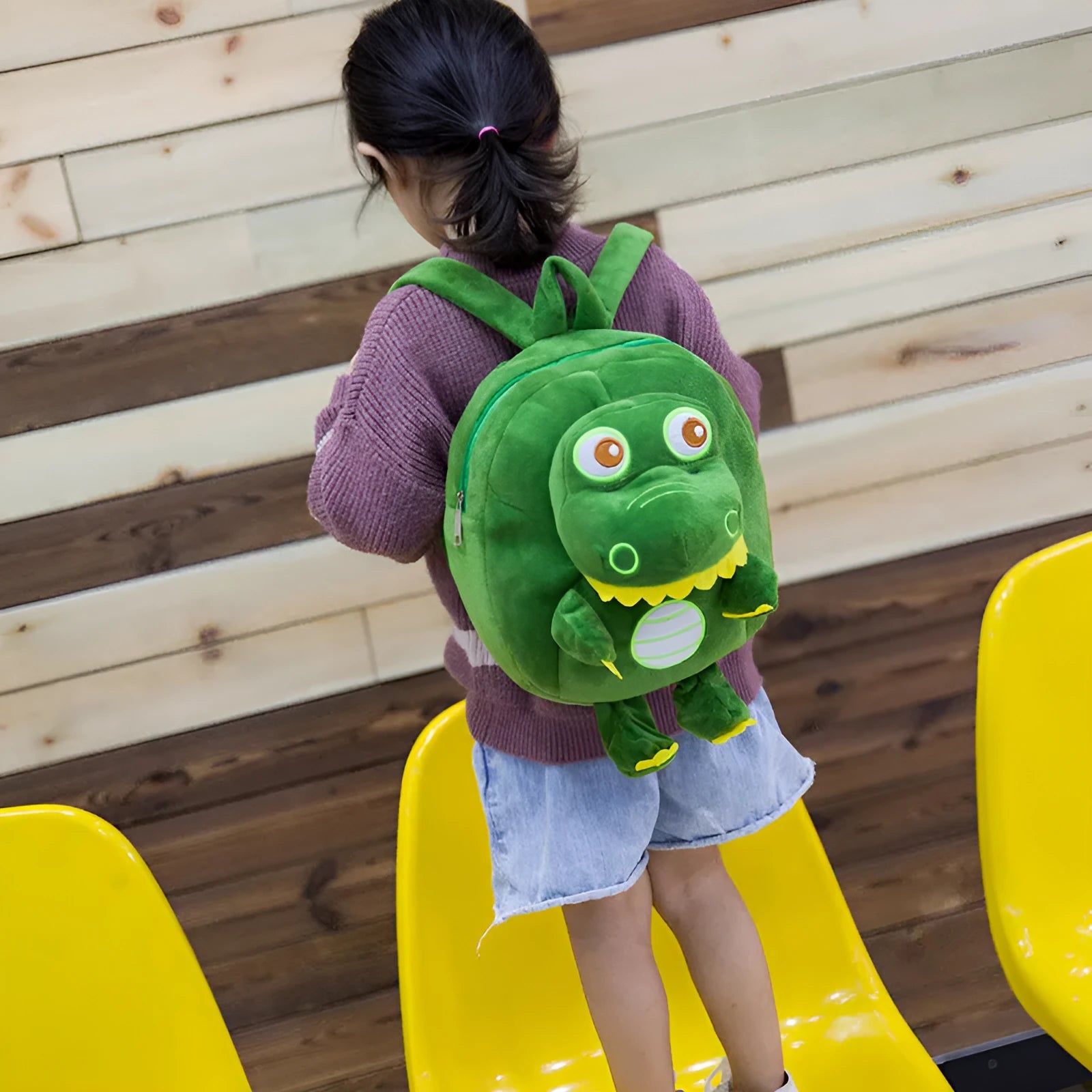 Children's dinosaur plush backpack with embroidery patterns in multiple colour options