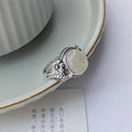 Adjustable open mouth copper vintage ring with white chalcedony colour stone
