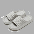 Leaf texture patterned EVA foam slippers for indoor household use, shown in multiple colours.