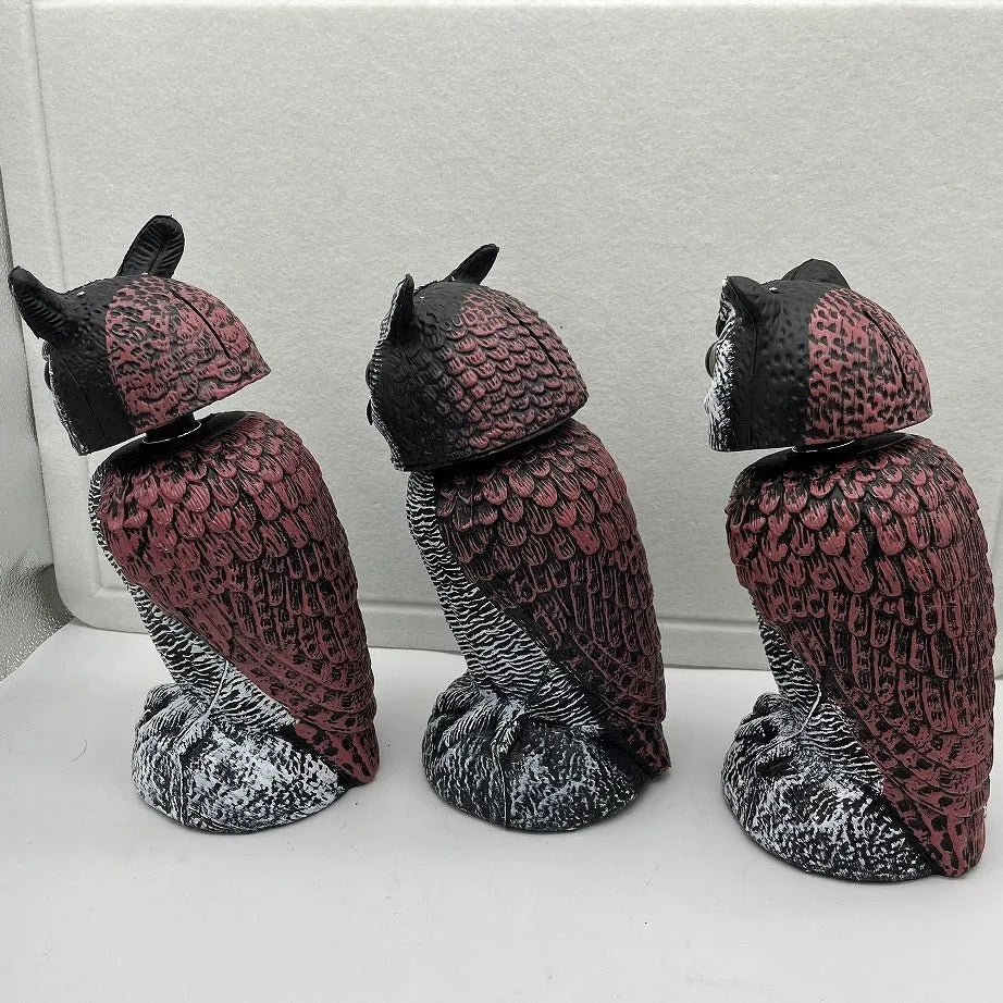 Artificial owl decoy with moving head for scaring birds, available with hook or bag attachments