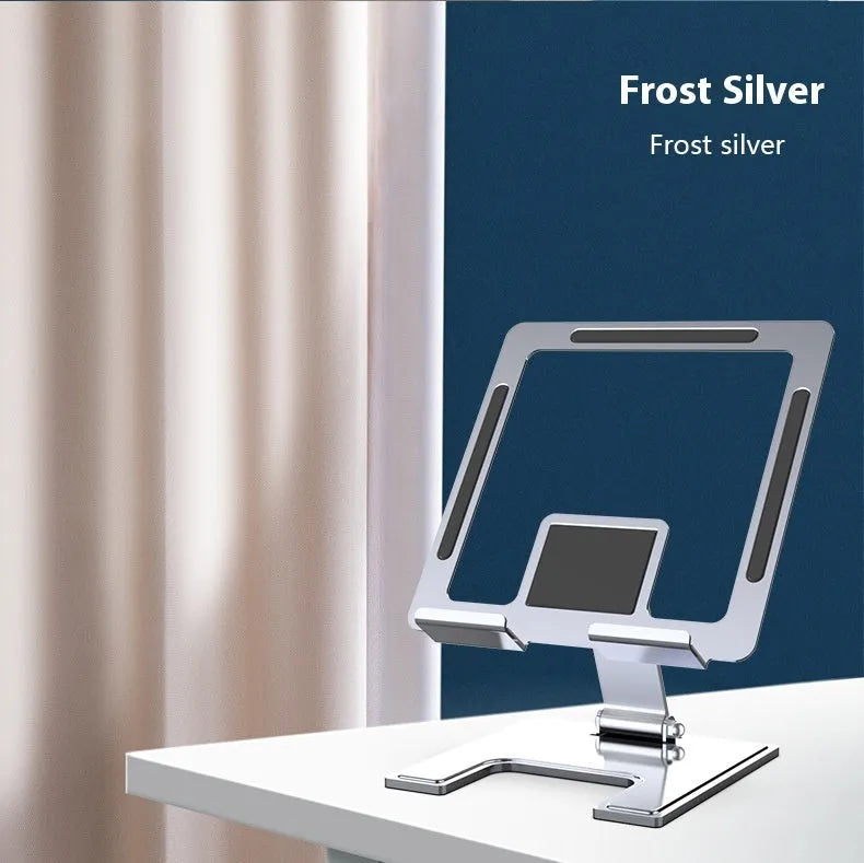 Flat black metal foldable notebook bracket with rotating base on a wooden desk