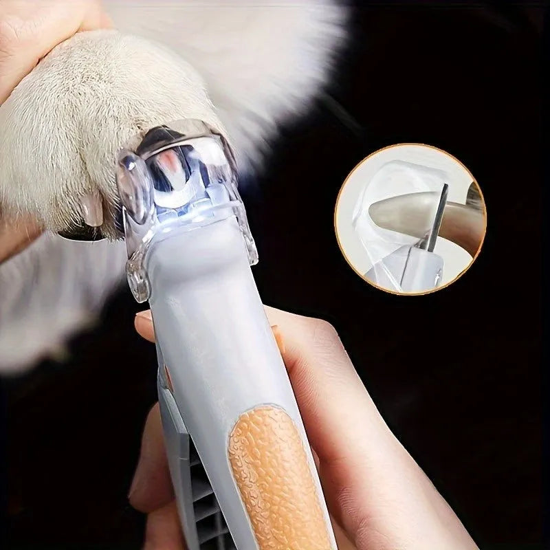 Yellow LED pet nail trimmer with magnifying glass, for trimming cat and dog nails safely.