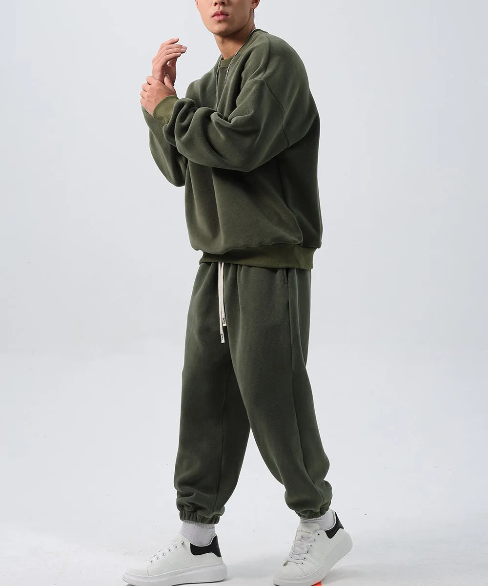 Men's polar fleece winter sports suit with long sleeve top and trousers in multiple colours.