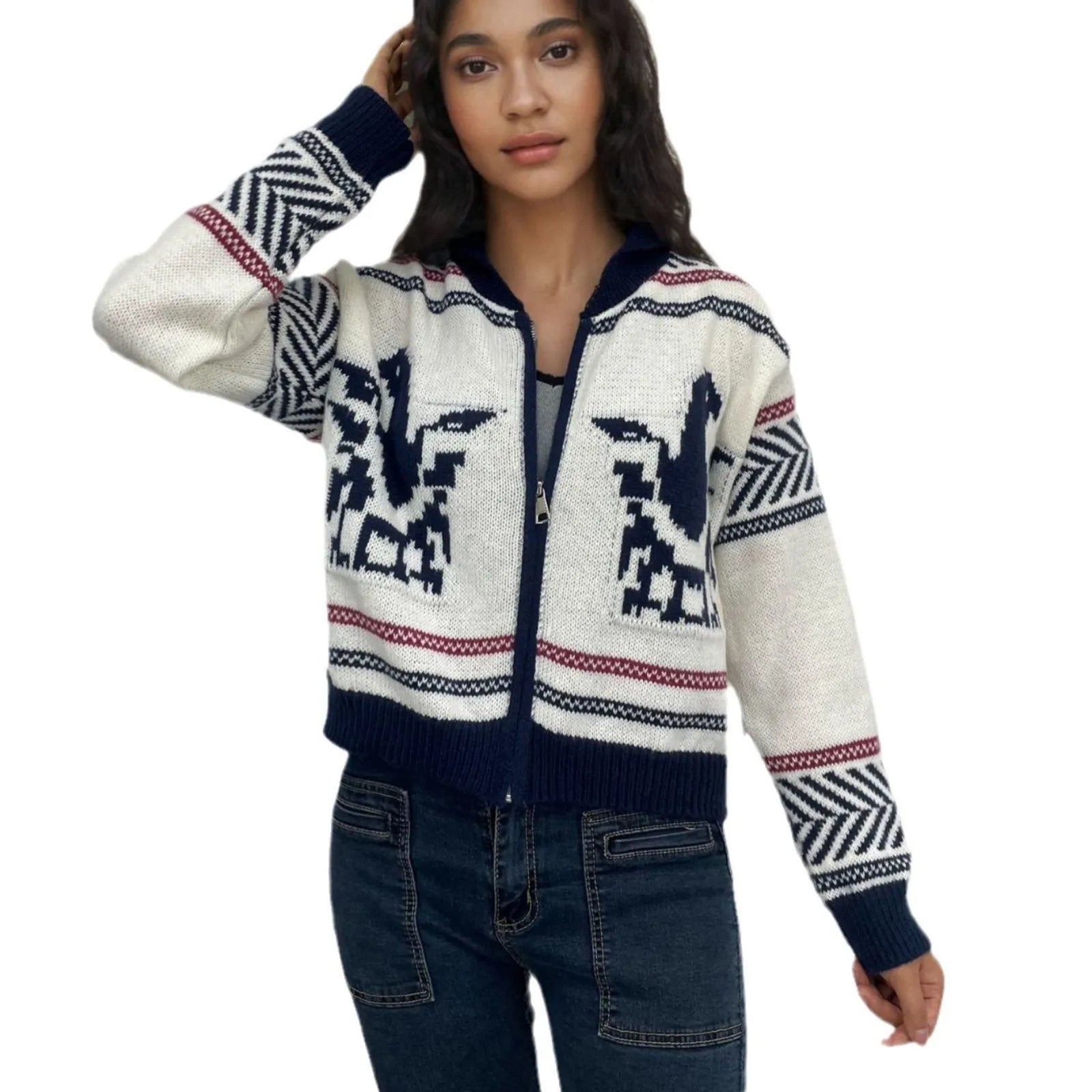 White women's jacquard cardigan with contrast stripes, zipper front, and lapel collar on a hanger.