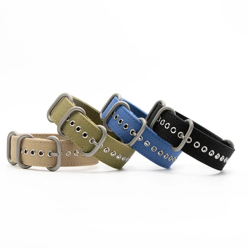 Canvas nylon thickened watch band with silver buckle in army green colour on a white background showing weave texture