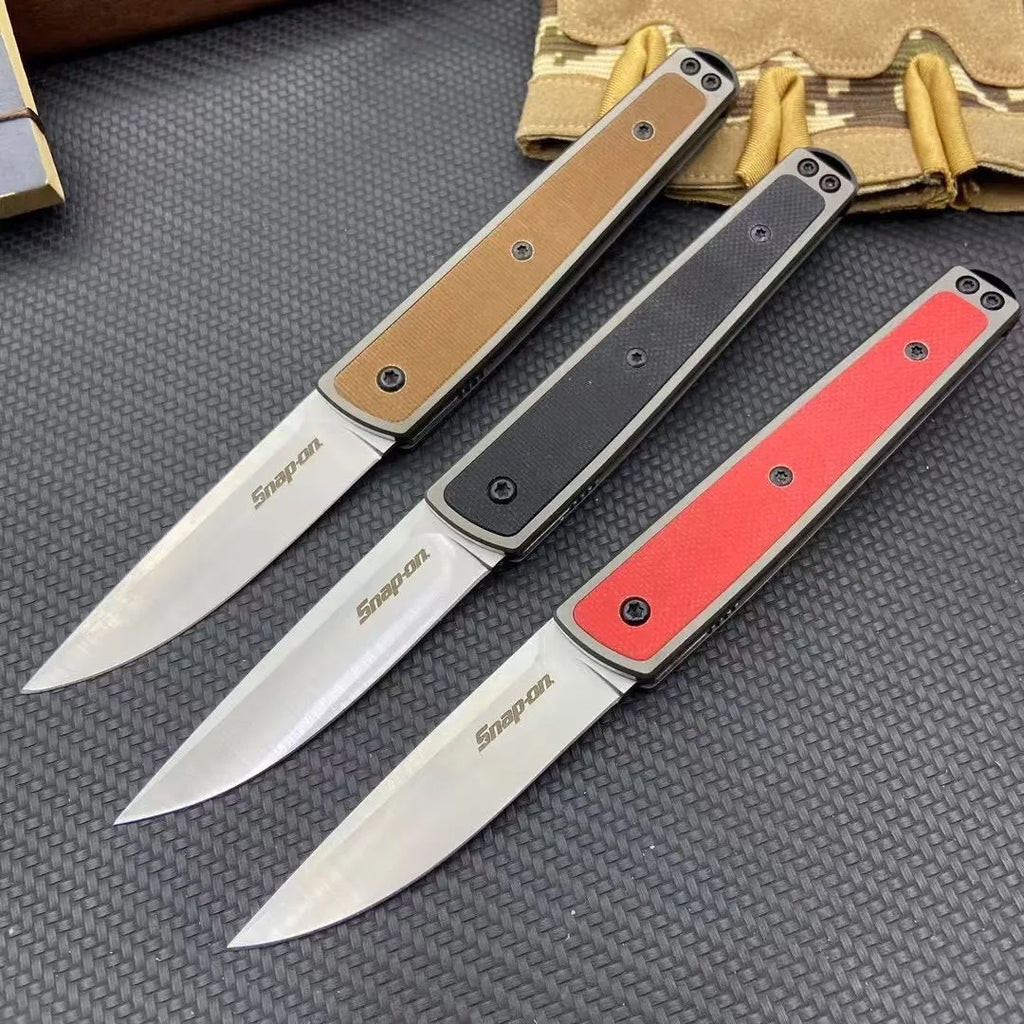 Folding fruit knife with stainless steel blade in black, brown, or red colour options