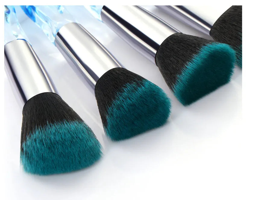 Set of 10 clear crystal handle foundation brushes with diamond shank design and synthetic bristles.