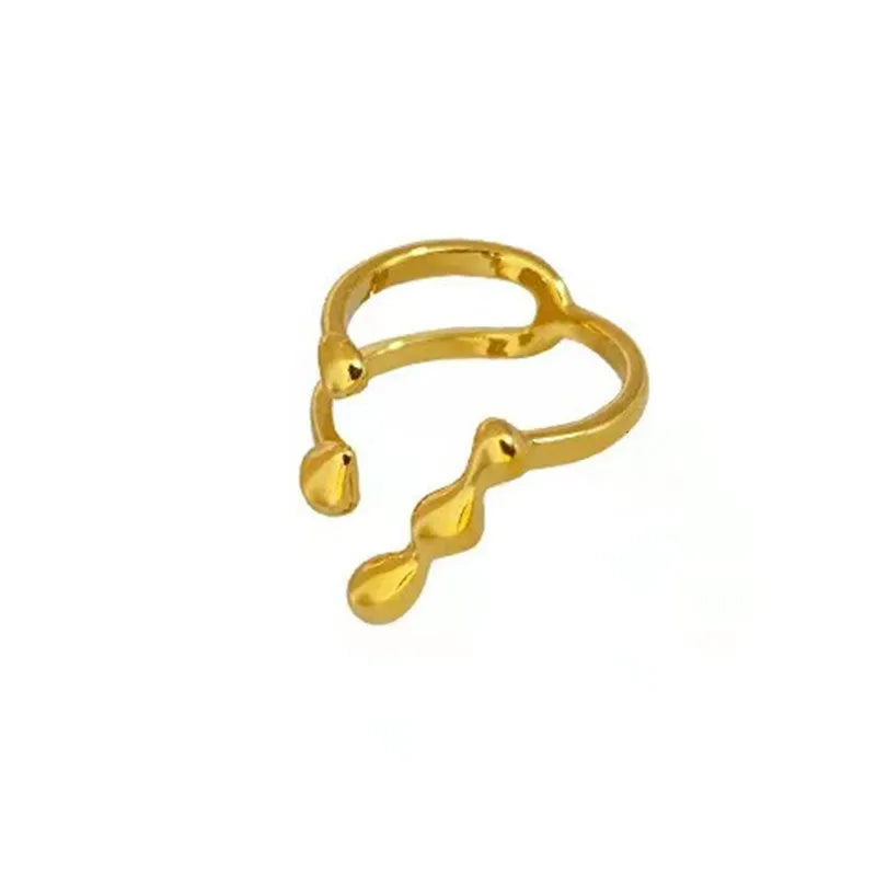 Brass opening ring with spherical elements in gold or silver colour for women's jewellery