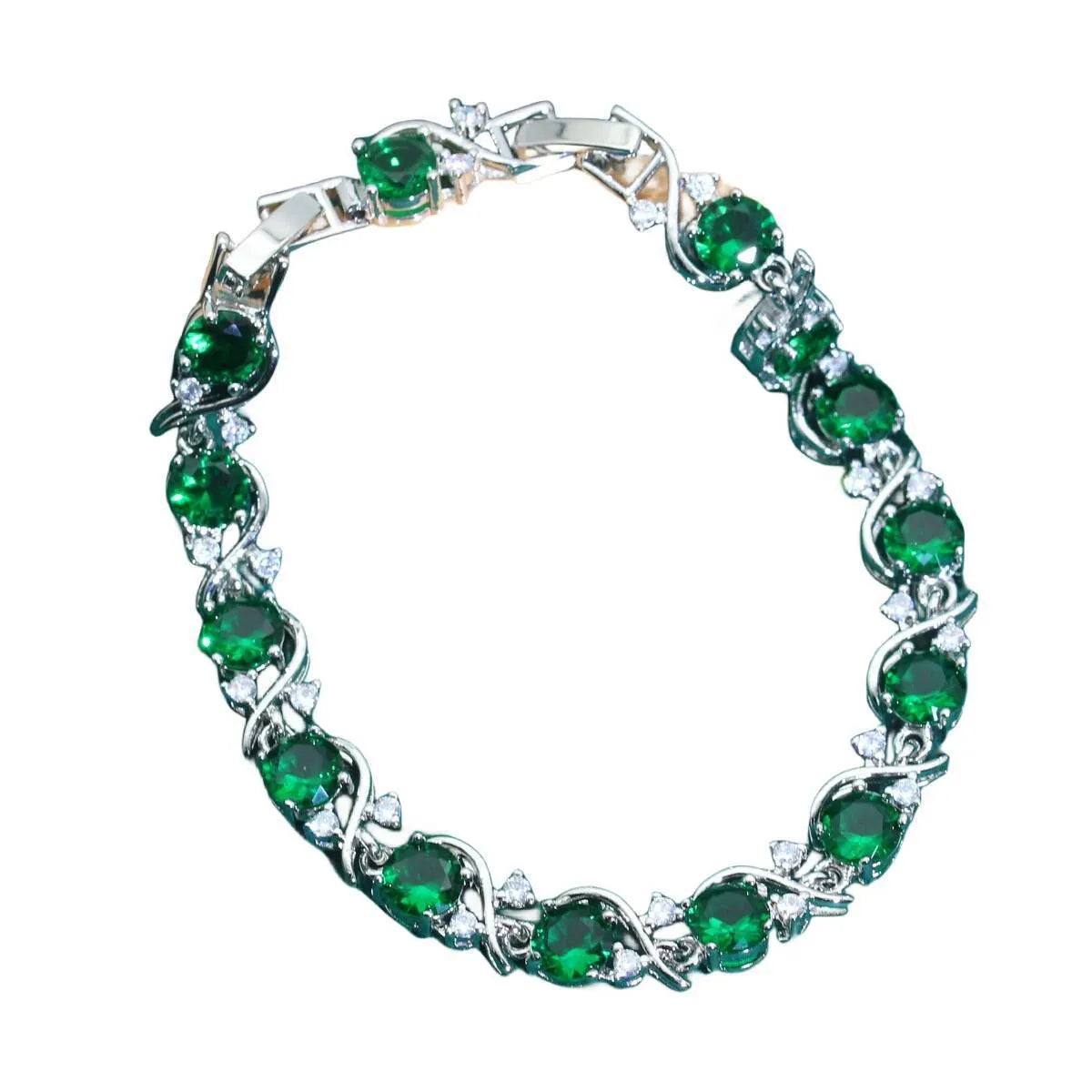 Female model wearing a golden green AAA zircon inlaid copper bracelet with a retro leaf shape design.