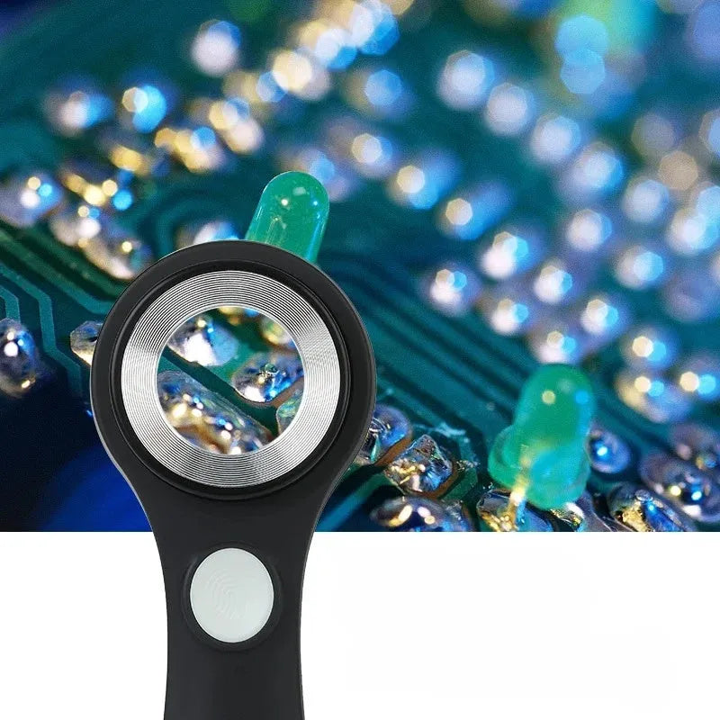 Black and silver metal jewellery appraisal magnifying glass with optical glass lens and USB-C cable.